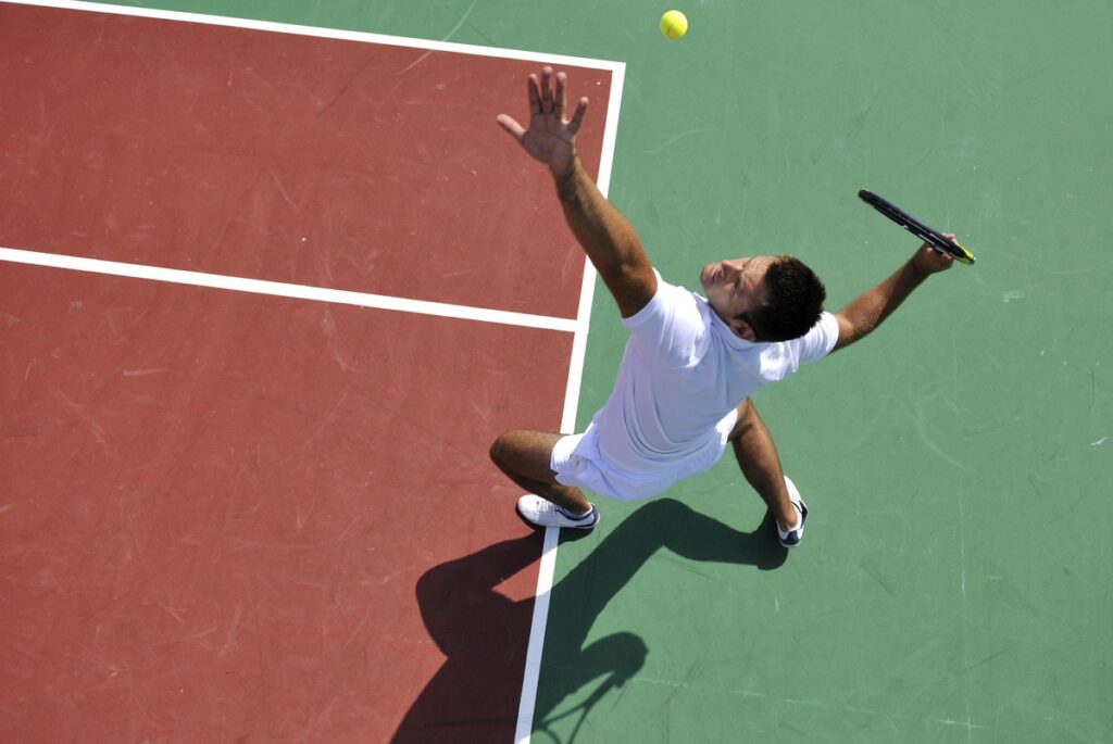 young-man-play-tennis-outdoor